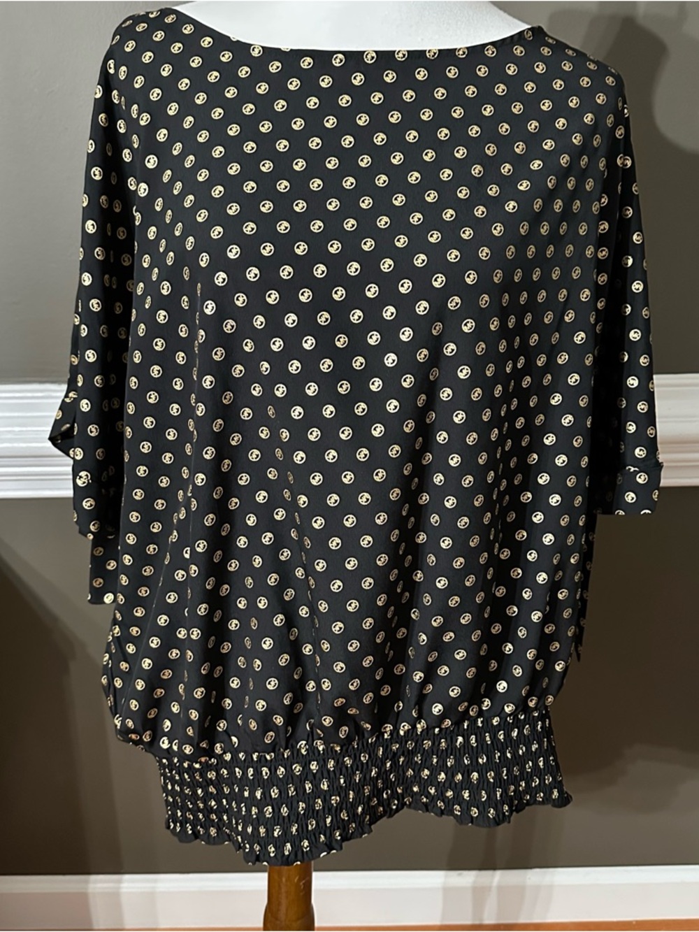 Michael Kors Black Blouse with Gold insignia Print. 2x